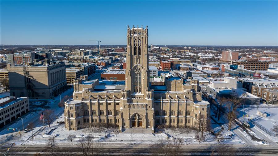 Snow-covered Gothic church tower in downtown Milwaukee